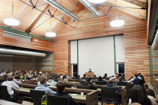 Students listening to a presentation by Chie Abad of Global Exchange