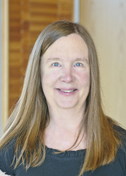 Claudia (center) with Linda Clute (left) and Bob Steele (right)