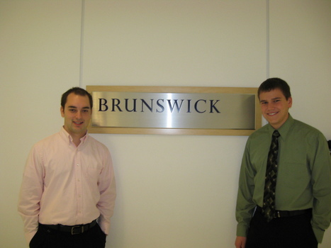 Daniel Harrison '09 and Jacob Krouse '09 at Brunswick Group LLC, an international corporate communications partnership, in New York, New York 
