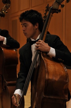 Management Fellow Phil Pascua is also a Bassist in the School of Music