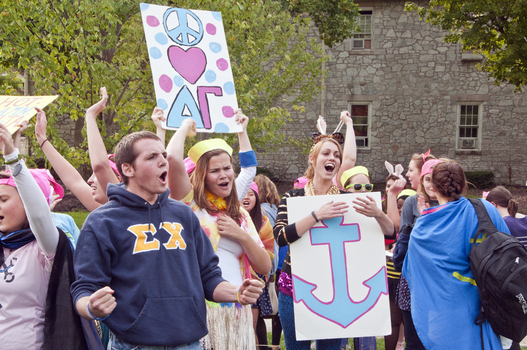 Students cheer on their teams during Greek Week Relay Races