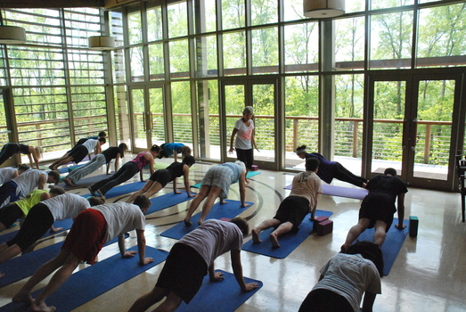 DePauw yogi, Nancy Butler, instructs a yoga class in the Bartlett Reflection Center as part of Prindlepalooza, an event to welcome incoming first year students.