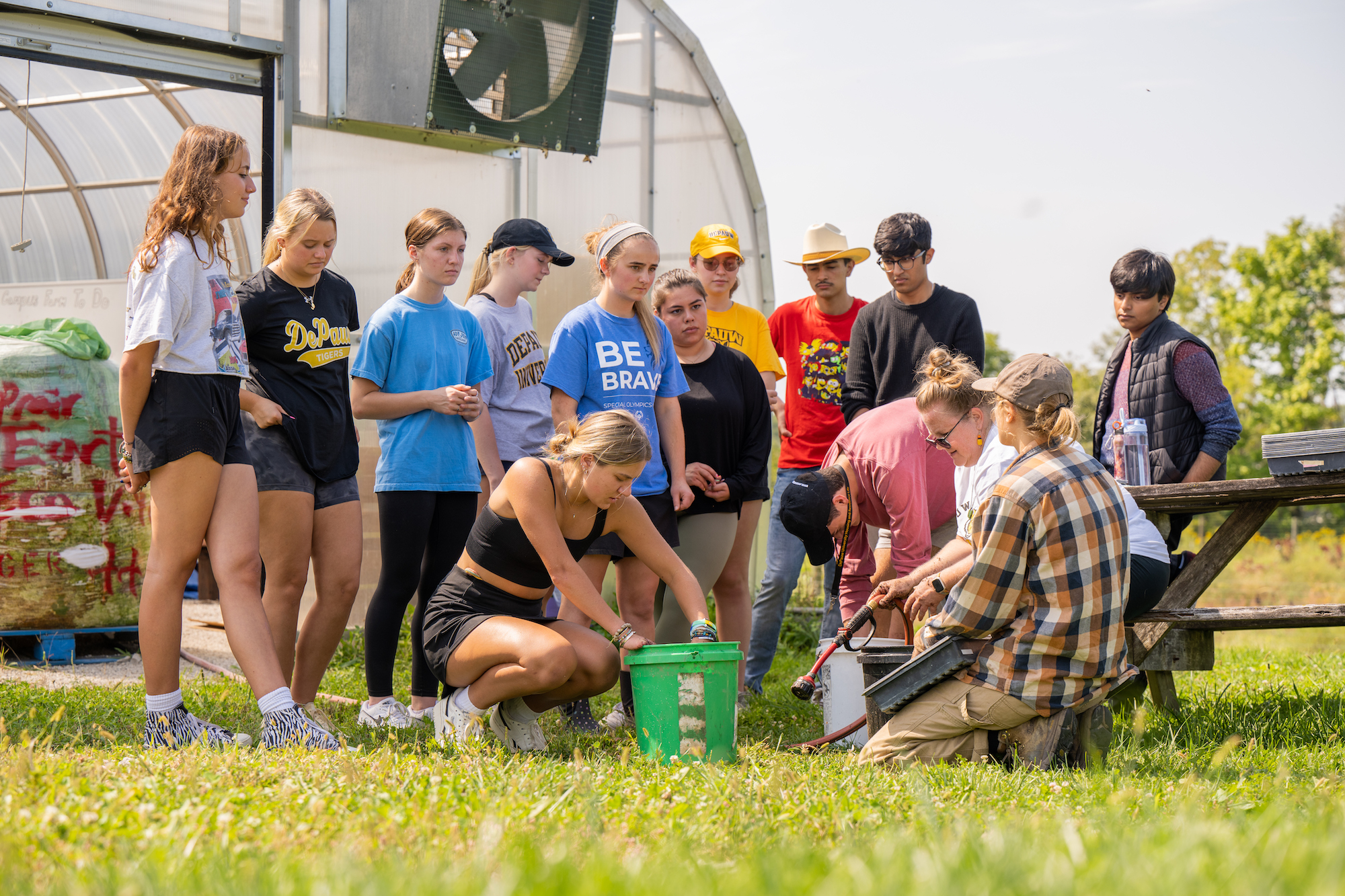 students talking about hydro-phobic properties of soil