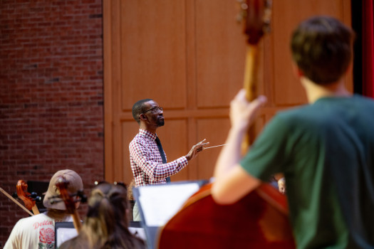 Prof. Bryon Black conducting the University Choir