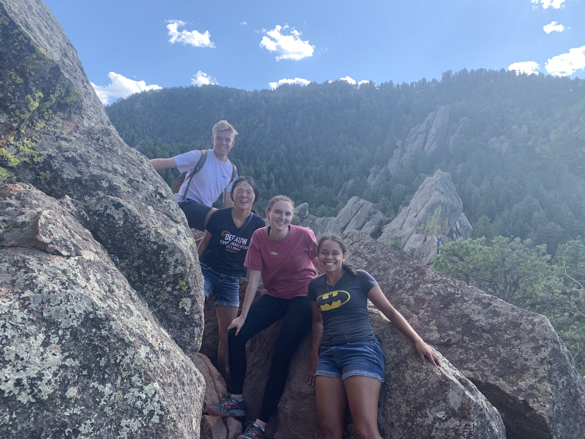 students standing on the side of a mountain 