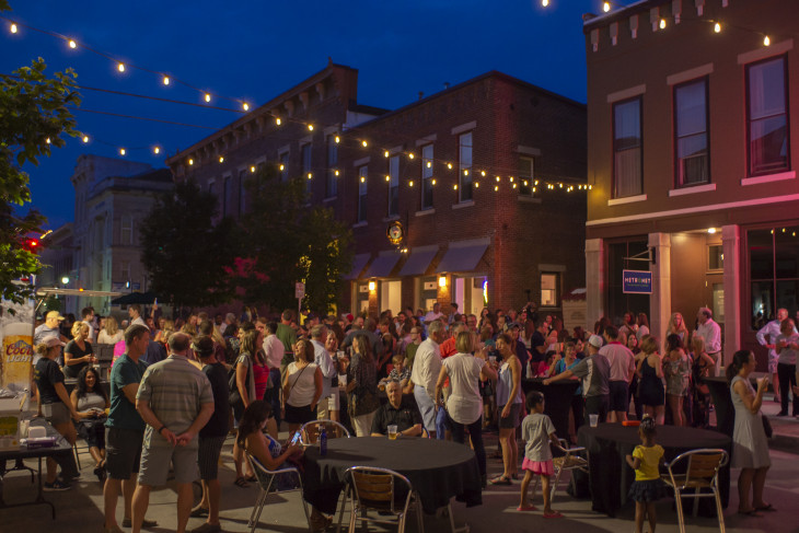 People gathered at first Friday street festival on Greencastle's town square.