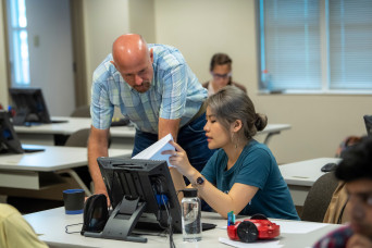 Professor and Student in Computer Lab