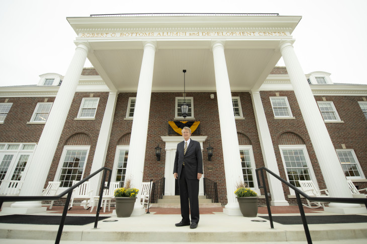 President Bottoms on the steps of the Bottoms Alumni Center