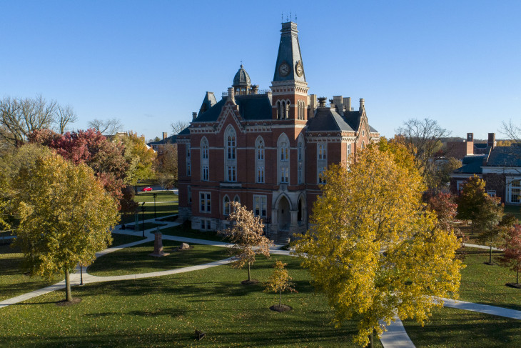 East College surrounded by trees changing color