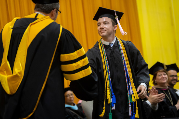 Liam Byrnes accepting his diploma