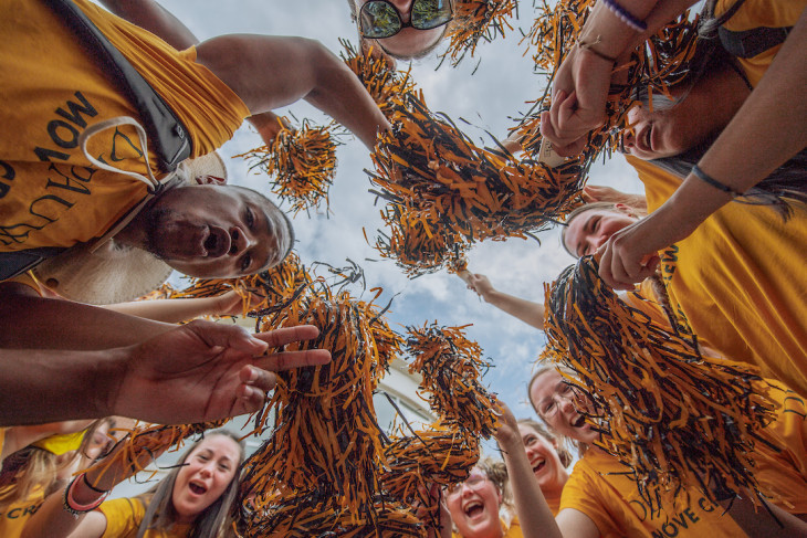 DePauw students celebrating incoming students arrival to campus.