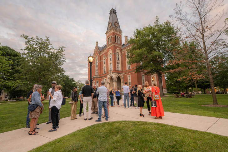 Alumni celebrating ARW in front of East College