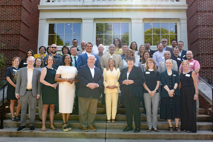 Attendees gather on the steps of Hoover Hall