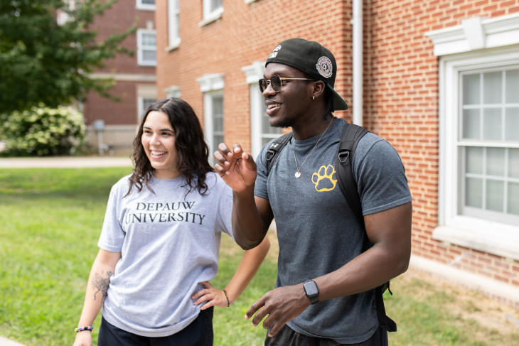 Kimario Davis '26 talks with a fellow resident assistant