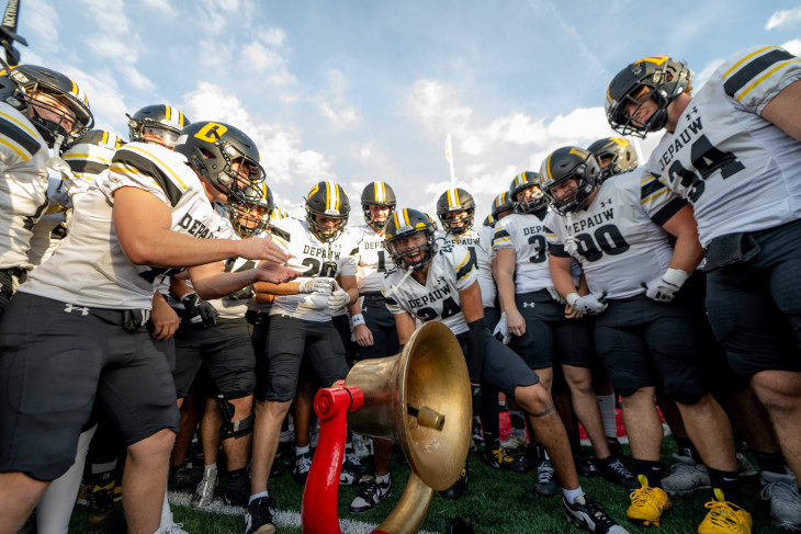DePauw football team ringing the Monon Bell