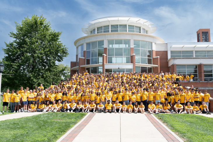 Class of 2030 in front of the Green Center for Performing Arts