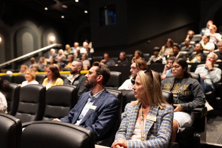 People seated inside the cinema