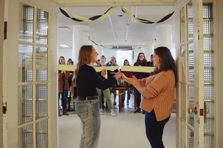 Students cut the ribbon to the newly renovated Thrifty Tiger store.