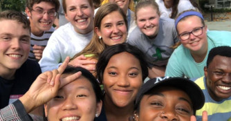 Students smiling at the camera