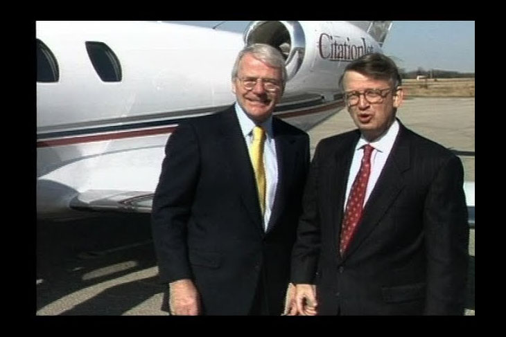 John Major and Bob Bottoms with a plane in the background