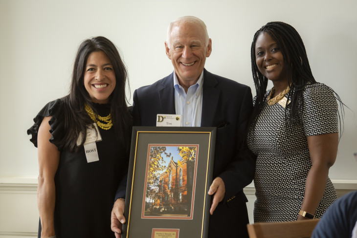 Alumni Association Board of Directors recognizing serve of their peers.