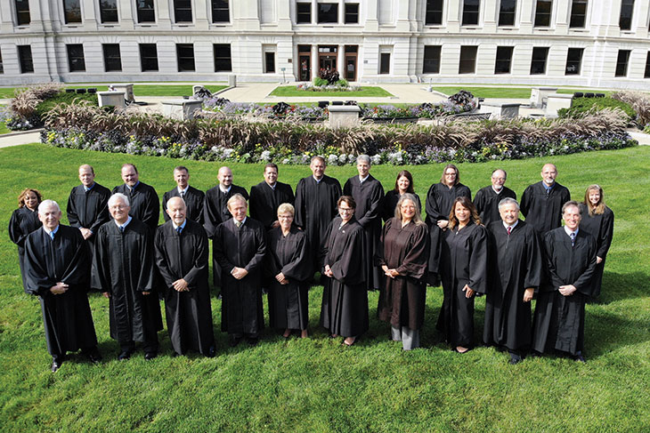 Drone shot of judges on a lawn