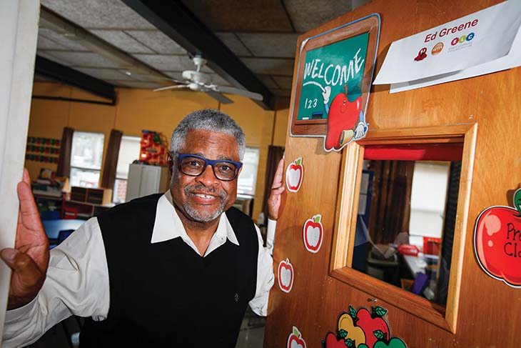 Edward Greene ’71 at a classroom door