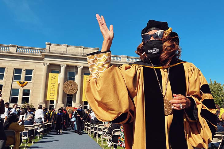 President White in Gold Regalia waving in front of Emison