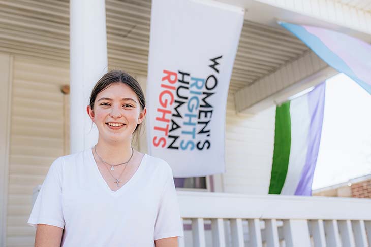 Zoe Knight ’25 in front of DePauw's Women's Center