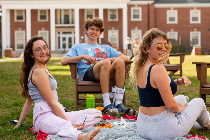 students sitting in the quad 