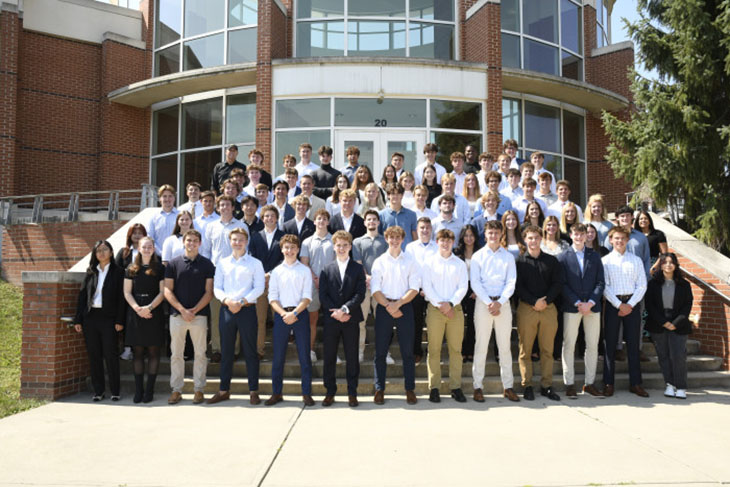 group photo in front of building