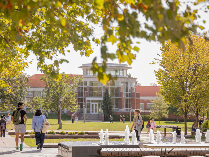 Students walking through Stewart Plaza