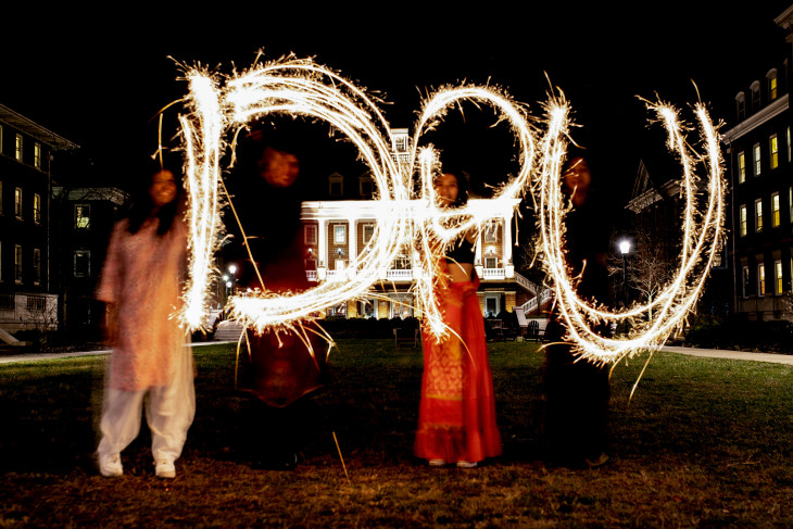 Celebrants of Diwali write DPU with sparklers