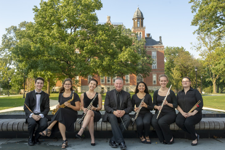 Senior wind musicians pictured with director of bands