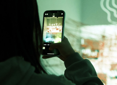 cell phone in hand with image