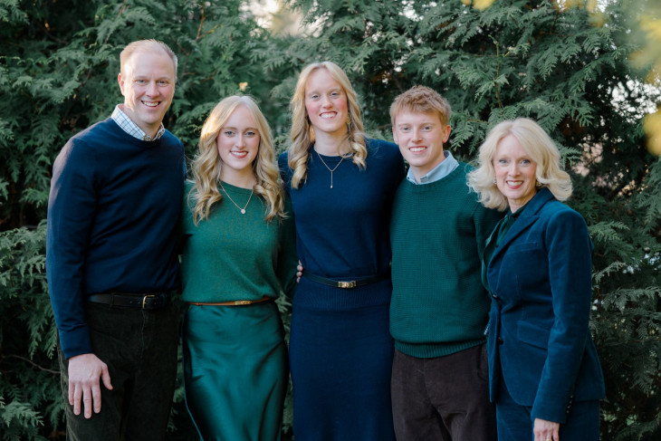 Empie family portrait with trees in background
