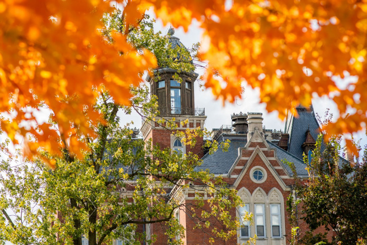 Brilliant orange leaves frame East College