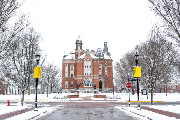Snowy campus shot featuring East College