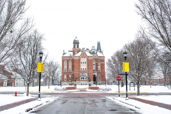 Snowy campus shot featuring East College 