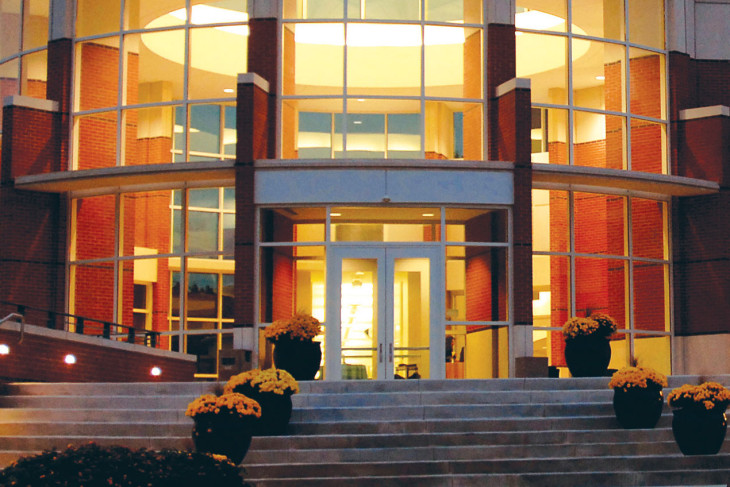 Green Center at dusk with a warm light inside