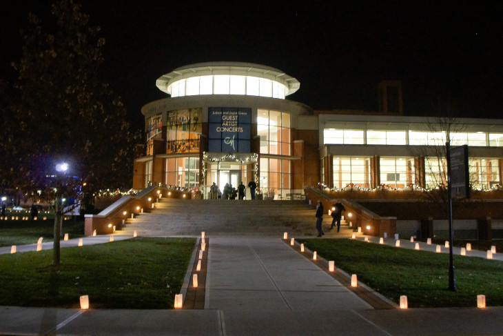 A building at night with interior lights on