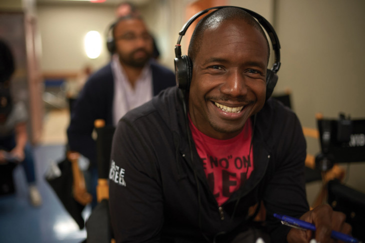 Marqui Jackson ’00 wearing headphones