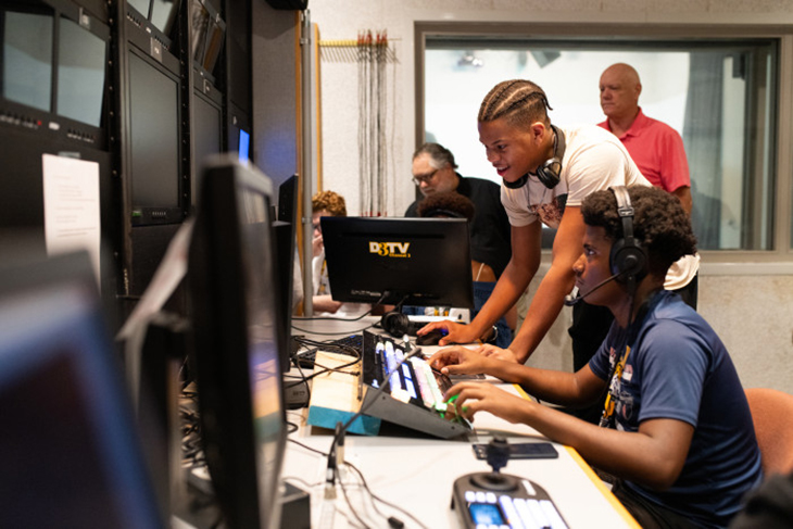 Students working in the media center