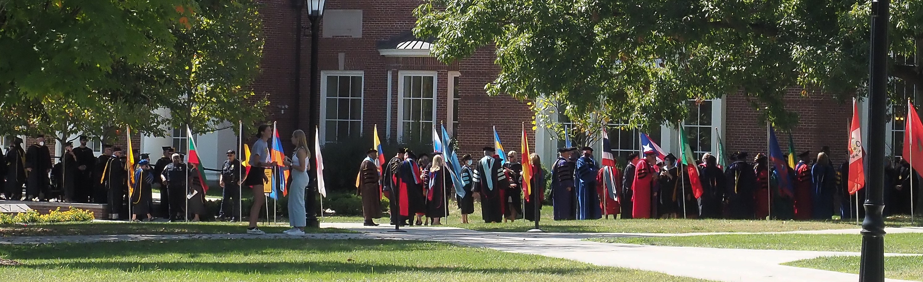 Delegates, faculty and staff prepare to process.