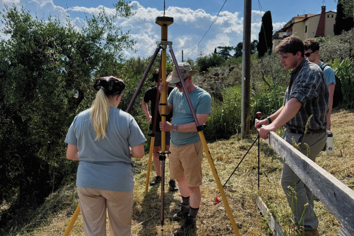 Pedar Foss and Ana Foutty ’27 set up the GPS equipment.