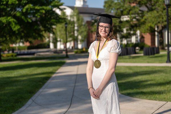 Maggie Perry '24 smiling during commencement