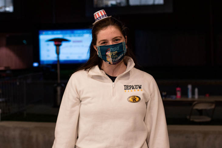 Student poses in patriotic regalia on Election Day