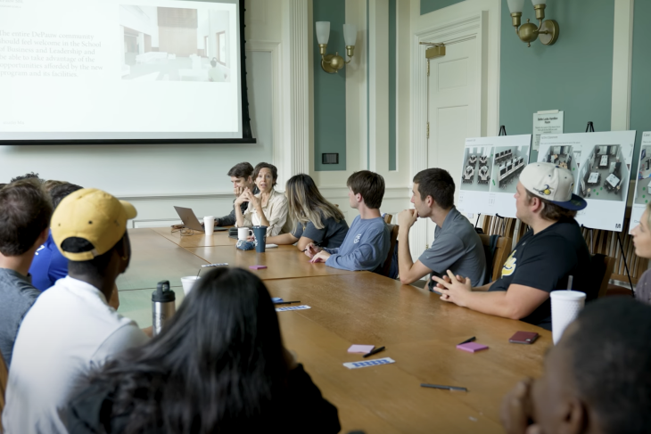 students learning about the new space of the school of business and leadership with the visiting architects 