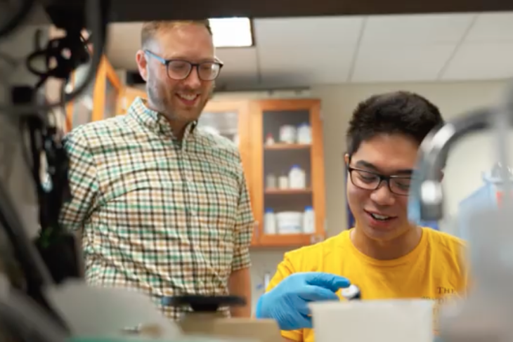 Student and professor at work doing research