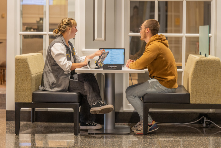 A student at DePauw is seen meeting one on one with an academic advisor. 
